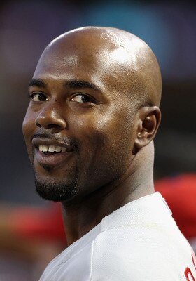 PHOENIX, AZ - APRIL 25:  Jimmy Rollins #11 of the Philadelphia Phillies smiles in the dugout during the Major League Baseball game against the Arizona Diamondbacks at Chase Field on April 25, 2011 in Phoenix, Arizona.  (Photo by Christian Petersen/Getty I