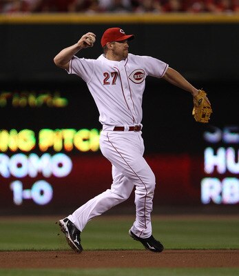 CINCINNATI - OCTOBER 10: Scott Rolen #27 of the Cincinnati Reds throws to 2nd base against the Philadelphia Phillies during game 3 of the NLDS at Great American Ball Park on October 10, 2010 in Cincinnati, Ohio. The Phillies defeated the Reds 2-0.  (Photo