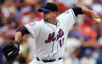 NEW YORK - JULY 24:  Billy Wagner #13 of the New York Mets pitches against the Philadelphia Phillies on July 24, 2008 at Shea Stadium in the Flushing neighborhood of the Queens borough of New York City. The Mets defeated the Phillies 3-1.  (Photo by Jim M