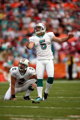 MIAMI - DECEMBER 19:  Kicker Dan Carpenter #5  reacts to missing a field goal late in the game against the Buffalo Bills at Sun Life Stadium on December 19, 2010 in Miami, Florida. The Bills defeated the Dolphins 17-14.  (Photo by Marc Serota/Getty Images