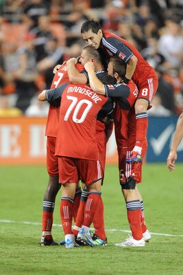WASHINGTON, DC - AUGUST 6:  Toronto FC celebrates their third goal during a soccer game against DC United at RFK Stadium on August 6, 2011 in Washington, DC.  The game ended in 1 3-3 tie.  (Photo by Mitchell Layton/Getty Images)