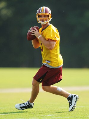 ASHBURN, VA - JULY 29:  John Beck #3 of the Washington Redskins looks to throw a pass during the first day of training camp at Redskins Park on July 29, 2011 in Ashburn, Virginia.  (Photo by Mitchell Layton/Getty Images)