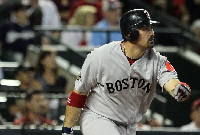 PHOENIX, AZ - JULY 12:  American League All-Star Adrian Gonzalez #28 of the Boston Red Sox hits a home run in the fourth inning of the 82nd MLB All-Star Game at Chase Field on July 12, 2011 in Phoenix, Arizona.  (Photo by Jeff Gross/Getty Images)