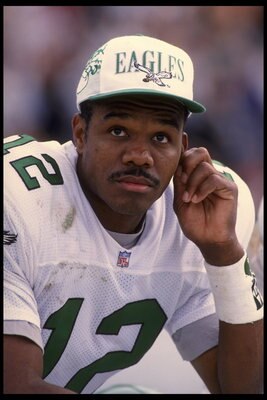 24 Sep 1995: Quarterback Randall Cunningham of the Philadelphia Eagles sits on the bench during the Eagles 48-17 loss to the Oakland Raiders at the Oakland Coliseum in Oakland, California.