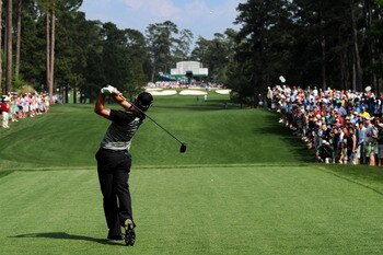 AUGUSTA, GA - APRIL 10:  Rory McIlroy of Northern Ireland hits a tee shot on the seventh hole during the final round of the 2011 Masters Tournament at Augusta National Golf Club on April 10, 2011 in Augusta, Georgia.  (Photo by Harry How/Getty Images)