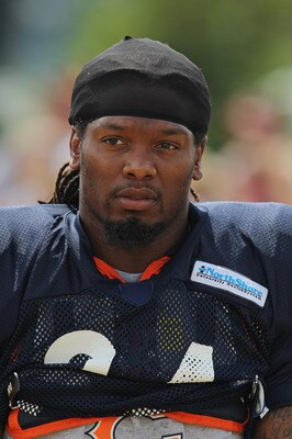 BOURBONNAIS, IL - AUGUST 06:  Marion Barber #24 of the Chicago Bears walks to a summer training camp practice at Olivet Nazarene University on August 6, 2011 in Bourbonnais, Illinois.  (Photo by Jonathan Daniel/Getty Images)