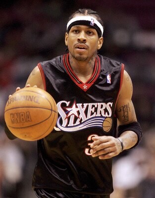 EAST RUTHERFORD, NJ - DECEMBER 10:  Allen Iverson #3 of the Philadelphia 76ers controls the ball against the New Jersey Nets during their game at Continental Airlines Arena on December 10, 2005 in East Rutherford, New Jersey. The Sixers defeated the Nets 