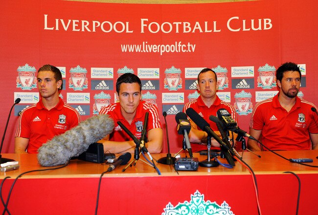 LIVERPOOL, UNITED KINGDOM - AUGUST 03:  Liverpool FC present new signings Charlie Adam (2ndR), Alexander Doni (R), Stewart Downing (2ndL) and Jordan Henderson (L) at a press conference at Melwood Training Ground on August 03, 2011 in Liverpool , England.