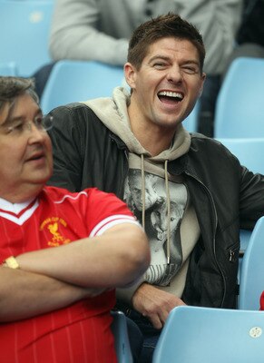 BIRMINGHAM, ENGLAND - MAY 22:  Liverpool Captain Stephen Gerrard watches from the stands during the Barclays Premier League match between Aston Villa and Liverpool at Villa Park on May 22, 2011 in Birmingham, England.  (Photo by Bryn Lennon/Getty Images)