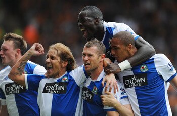 WOLVERHAMPTON, ENGLAND - MAY 22: Brett Emerton of Blackburn celebrates scoring to make it 2-0 with team mates Michel Salgado, Christopher Samba and Martin Olsson during the Barclays Premier League match between Wolverhampton Wanderers and Blackburn Rovers