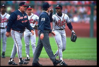 ATLANTA BRAVES INFIELDER LONNIE SMITH GETS IN THE FACE OF AN UNIDENTIFIED UMPIRE DURING THE BRAVES VERSUS SAN FRANCISCO GIANTS GAME AT CANDLESTICK PARK IN SAN FRANCISCO, CALIFORNIA. MANDATORY CREDIT: OTTO GREULE/ALLSPOR