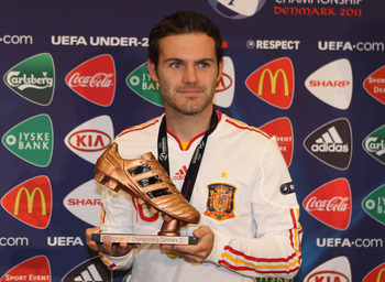 ARHUS, DENMARK - JUNE 25:  Juan Mata  of Spain receives the bronze boot after the UEFA European Under-21 Championship Final match between Spain and Switzerland at the Arhus Stadium on June 25, 2011 in Arhus, Denmark.  (Photo by Michael Steele/Getty Images