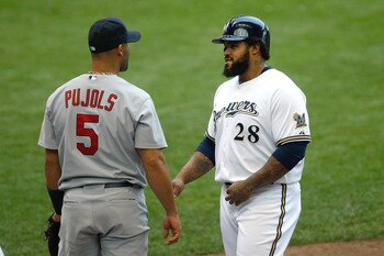 MILWAUKEE, WI - AUGUST 03: Prince Fielder #28 of the Milwaukee Brewers has words with Albert Pujols #5 of the St. Louis Cardinals at first base at Miller Park on August 3, 2011 in Milwaukee, Wisconsin. (Photo by Scott Boehm/Getty Images)