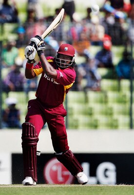 DHAKA, BANGLADESH - MARCH 23:  Chris Gayle of West Indies bats during the 1st quarterfinal of the ICC Cricket World Cup at Shere-e-Bangla National Stadium on March 23, 2011 in Dhaka, Bangladesh.  (Photo by Daniel Berehulak/Getty Images)