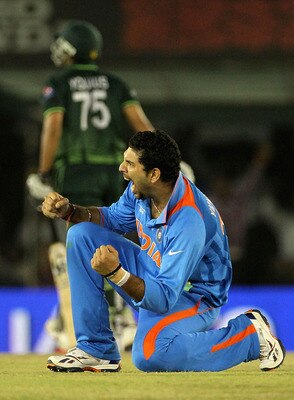 MOHALI, INDIA - MARCH 30:  Yuvraj Singh of India celebrates after taking the wicket of Younis Khan of Pakistan during the 2011 ICC World Cup second Semi-Final between Pakistan and India at Punjab Cricket Association (PCA) Stadium on March 30, 2011 in Moha