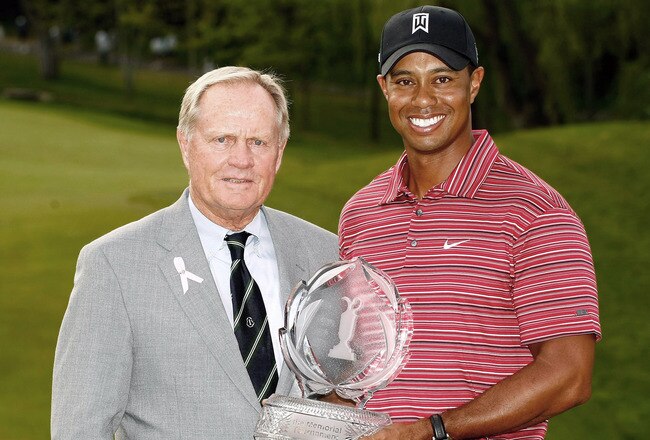 DUBLIN, OH - JUNE 07: Jack Nicklaus presents Tiger Woods with the trophy after his one-stroke victory at the Memorial Tournament at the Muirfield Village Golf Club on June 7, 2009 in Dublin, Ohio. (Photo by Scott Halleran/Getty Images)