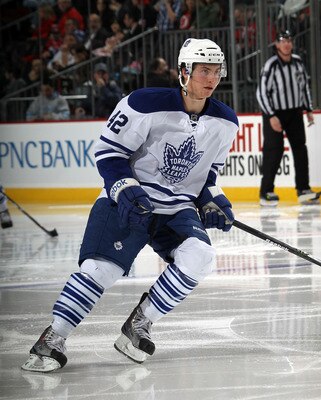 NEWARK, NJ - APRIL 06:  Tyler Bozak #42 of the Toronto Maple Leafs skates against the New Jersey Devils at the Prudential Center on April 6, 2011 in Newark, New Jersey.  (Photo by Bruce Bennett/Getty Images)