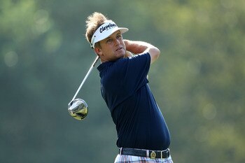 JOHNS CREEK, GA - AUGUST 09:   David Toms hits a shot during a practice round prior to the start of the 93rd PGA Championship at the Atlanta Athletic Club on August 9, 2011 in Johns Creek, Georgia.  (Photo by Andrew Redington/Getty Images)
