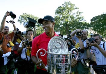 MEDINAH, IL - AUGUST 20:  Tiger Woods holds the Wanamaker Trophy after winning the 2006 PGA Championship at Medinah Country Club on August 20, 2006 in Medinah, Illinois.  (Photo by Stuart Franklin/Getty Images)