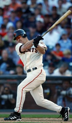 SAN FRANCISCO - OCTOBER 12:  Second baseman Jeff Kent #21 of the San Francisco Giants puts the ball in play during Game three of the National League Championship Series against the St. Louis Cardinals in the 2002 World Series at Pacific Bell Park on Octob