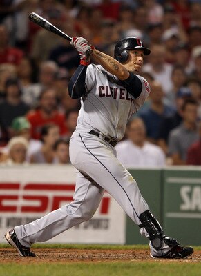 BOSTON, MA - AUGUST 01:  Asdrubal Cabrera #13 of the Cleveland Indians watches his hit in the eighth inning against the Boston Red Sox on August 1, 2011 at Fenway Park in Boston, Massachusetts. The hit was ruled a two run homer after an official review. (