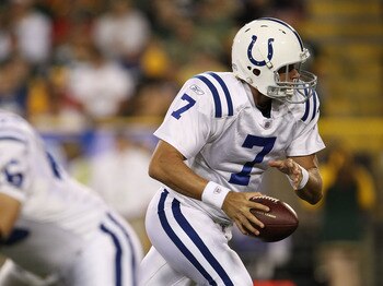 GREEN BAY, WI - AUGUST 26: Curtis Painter #7 of the Indianapolis Colts turns to hand off during a preseason game against the Green Bay Packers at Lambeau Field on August 26, 2010 in Green Bay, Wisconsin. The Packers defeated the Colts 59-24. (Photo by Jon