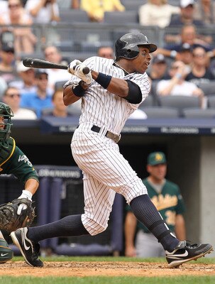 NEW YORK, NY - JULY 24:  Curtis Granderson #14 of the New York Yankees  in action against the Oakland Athletics  during their game on July 24, 2011 at Yankee Stadium in the Bronx borough of New York City.  (Photo by Al Bello/Getty Images)