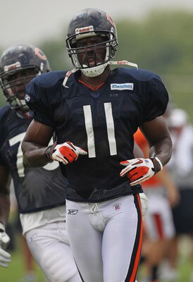 BOURBONNAIS, IL - AUGUST 06:  Roy Williams #11 of the Chicago Bears works out during a summer training camp practice at Olivet Nazarene University on August 6, 2011 in Bourbonnais, Illinois.  (Photo by Jonathan Daniel/Getty Images)