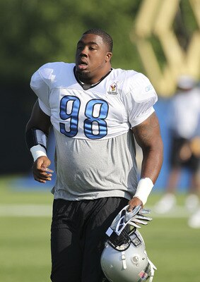 ALLEN PARK, MI - AUGUST 01:  Nick Fairley #98 of the Detroit Lions get ready for the start of the days practice session at the Lions training facility on August 1, 2011 in Allen Park, Michigan.  (Photo by Leon Halip/Getty Images)