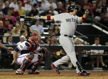 PHOENIX, AZ - JULY 12:  American League All-Star Adrian Gonzalez #28 of the Boston Red Sox hits a home run in the fourth inning of the 82nd MLB All-Star Game at Chase Field on July 12, 2011 in Phoenix, Arizona.  (Photo by Jeff Gross/Getty Images)