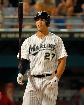 MIAMI GARDENS, FL - AUGUST 04:  Mike Stanton #27 of the Florida Marlins reacts after striking out during a game against the St. Louis Cardinals at Sun Life Stadium on August 4, 2011 in Miami Gardens, Florida.  (Photo by Mike Ehrmann/Getty Images)