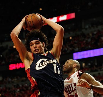 CHICAGO - APRIL 22: Anderson Varejao #17 of the Cleveland Cavaliers grabs a rebound over Taj Gibson #22 of the Chicago Bulls in Game Three of the Eastern Conference Quarterfinals during the 2010 NBA Playoffs at the United Center on April 22, 2010 in Chica