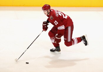GLENDALE, AZ - JANUARY 15:  Oliver Ekman-Larsson #23 of the Phoenix Coyotes skates with the puck during the NHL game against the Anaheim Ducks at Jobing.com Arena on January 15, 2011 in Glendale, Arizona.  The Coyotes defeated the Ducks 6-2.  (Photo by Ch