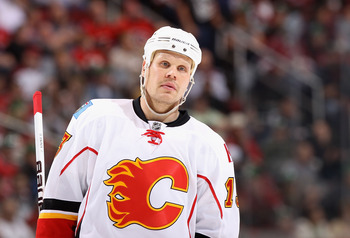 GLENDALE, AZ - MARCH 10:  Olli Jokinen #13 of the Calgary Flames in action during the NHL game against the Phoenix Coyotes at Jobing.com Arena on March 10, 2011 in Glendale, Arizona.  The Coyotes defeated the Flames 3-0.  (Photo by Christian Petersen/Gett