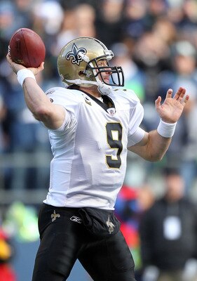 SEATTLE, WA - JANUARY 08:  Quarterback Drew Brees #9 of the New Orleans Saints throws the ball in the second quarter against the Seattle Seahawks during the 2011 NFC wild-card playoff game at Qwest Field on January 8, 2011 in Seattle, Washington.  (Photo