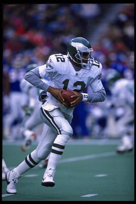 19 Nov 1995:  Quarterback Randall Cunningham #12 of the Philadelphia Eagles drops back for center during the Eagles 28-19 victory over the New York Giants at Veterans Stadium in Philadelphia, Pennsylvania.  Mandatory Credit:  Ken White/Allsport