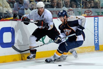 NASHVILLE, TN - APRIL 20:  Teemu Selanne #8 of the Anaheim Ducks skates against Jonathon Blum #7 of the Nashville Predators in Game Four of the Western Conference Quarterfinals during the 2011 NHL Stanley Cup Playoffs at Bridgestone Arena on April 20, 201