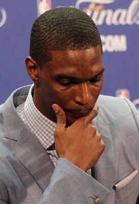 MIAMI, FL - JUNE 12:  Chris Bosh #1 of the Miami Heat answers questions from the media at a post game press conference after the Dallas Mavericks won 105-95 in Game Six of the 2011 NBA Finals at American Airlines Arena on June 12, 2011 in Miami, Florida.