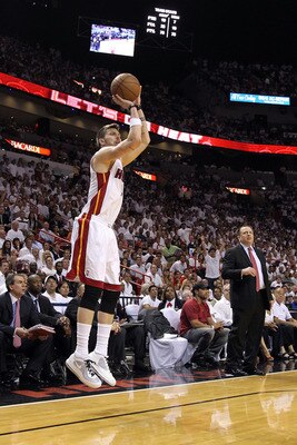 MIAMI, FL - MAY 24:  Mike Miller #13 of the Miami Heat atttempts a shot as head caoch Tom Thibodeau of the Chicago Bulls looks on in Game Four of the Eastern Conference Finals during the 2011 NBA Playoffs on May 24, 2011 at American Airlines Arena in Miam