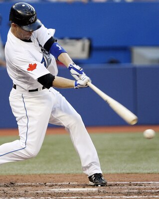 TORONTO, CANADA - JULY 15: Aaron Hill #2 of the Toronto Blue Jays hits against the New York Yankees during MLB action at The Rogers Centre July 15, 2011 in Toronto, Ontario, Canada. (Photo by Abelimages/Getty Images)