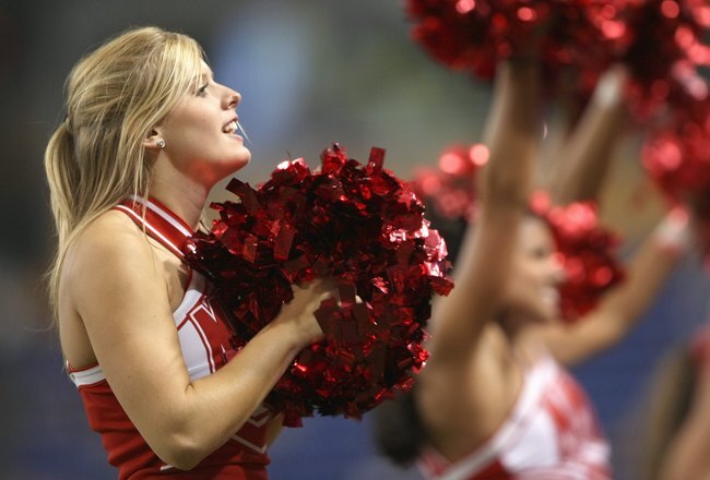 MINNEAPOLIS, MN - SEPTEMBER 8: A cheerleader of the Miami of Ohio Redhawks performs on the field against the Minnesota Golden Gophers at the Metrodome on September 8, 2007 in Minneapolis, Minnesota. (Photo by Doug Pensinger/Getty Images)