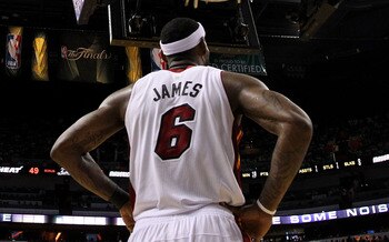 MIAMI, FL - JUNE 12:  LeBron James #6 of the Miami Heat looks on against the Dallas Mavericks in Game Six of the 2011 NBA Finals at American Airlines Arena on June 12, 2011 in Miami, Florida. The Mavericks won 105-95. NOTE TO USER: User expressly acknowle