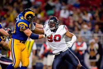 ST. LOUIS - DECEMBER 20:  Mario Williams #90 of the Houston Texans rushes against Adam Goldberg #73 of the St. Louis Rams at Edward Jones Dome on December 20, 2009 in St. Louis, Missouri.  (Photo by Dilip Vishwanat/Getty Images)