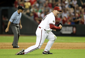 PHOENIX, AZ - AUGUST 09:  Relief pitcher J.J. Putz #40 of the Arizona Diamondbacks celebrates after defeating the Houston Astros in the Major League Baseball game at Chase Field on August 9, 2011 in Phoenix, Arizona. The Diamondbacks defeated the Astros 1