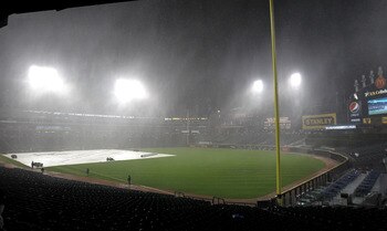CHICAGO, IL - AUGUST 02: A storm stops a game between the Chicago White Sox and the New York Yankees in the 7th inning at U.S. Cellular Field on August 2, 2011 in Chicago, Illinois. (Photo by Jonathan Daniel/Getty Images)