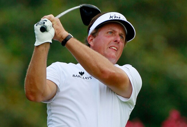 JOHNS CREEK, GA - AUGUST 12:  Phil Mickelson hits a tee shot on the third hole during the second round of the 93rd PGA Championship at the Atlanta Athletic Club on August 12, 2011 in Johns Creek, Georgia.  (Photo by Kevin C. Cox/Getty Images)