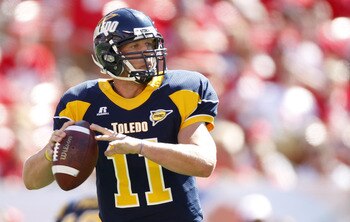 CLEVELAND - SEPTEMBER 19:  Aaron Opelt #11 of the Toledeo Rockets gets ready to throw a fourth quarter pass while playing the Ohio State Buckeyes on September 19, 2009 at Cleveland Browns Stadium in Cleveland, Ohio. Ohio State won the game 38-0. (Photo by