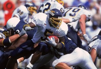 2 Sep 2000:  Antwon McCray #5 of the Toledo Rockets moves with the ball during the game against the Penn State Nittany Lions at the Beaver Stadium in State College, Pennsylvania. The Rockets defeated the Nittany Lions 24-6.Mandatory Credit: Ezra O. Shaw  