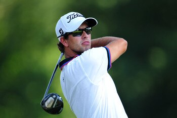 JOHNS CREEK, GA - AUGUST 12:  Adam Scott of Australia watches his tee shot on the 16th hole during the second round of the 93rd PGA Championship at the Atlanta Athletic Club on August 12, 2011 in Johns Creek, Georgia.  (Photo by Stuart Franklin/Getty Imag