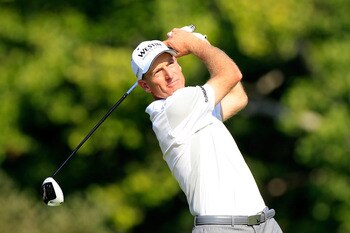 JOHNS CREEK, GA - AUGUST 12:  Jim Furyk watches his tee shot on the 14th hole during the second round of the 93rd PGA Championship at the Atlanta Athletic Club on August 12, 2011 in Johns Creek, Georgia.  (Photo by Sam Greenwood/Getty Images)